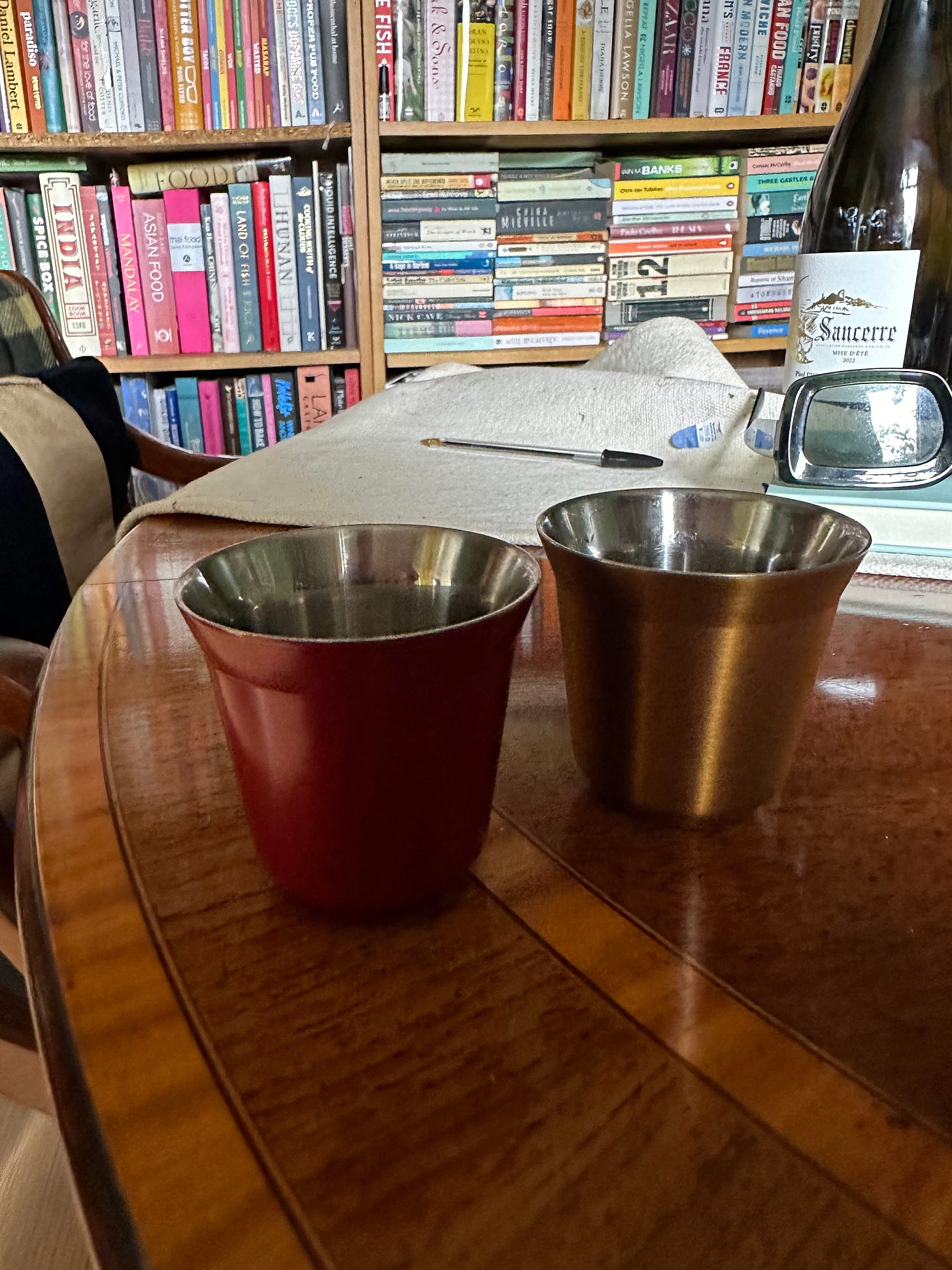 Two Nespresso aluminium beakers, €1 each