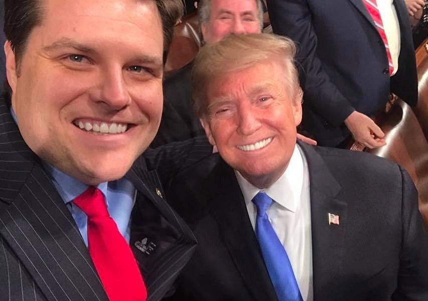 Gaetz denied the accusations against him after the New York Times revealed Tuesday that the DOJ had launched a probe to investigate whether he had violated federal sex trafficking laws. Pictured Trump and Gaetz