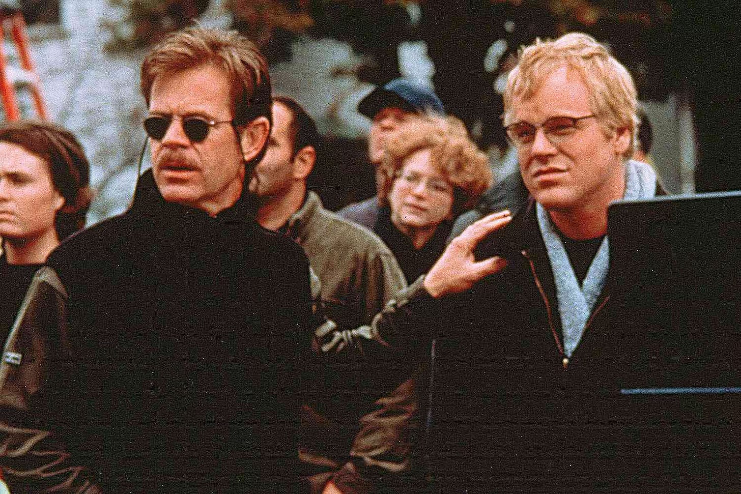 William H. Macey and Philip Seymour Hoffman in State and Main. Macy and Hoffman behind a film camera, attempting to shoot the film within a film "The Old Mill."