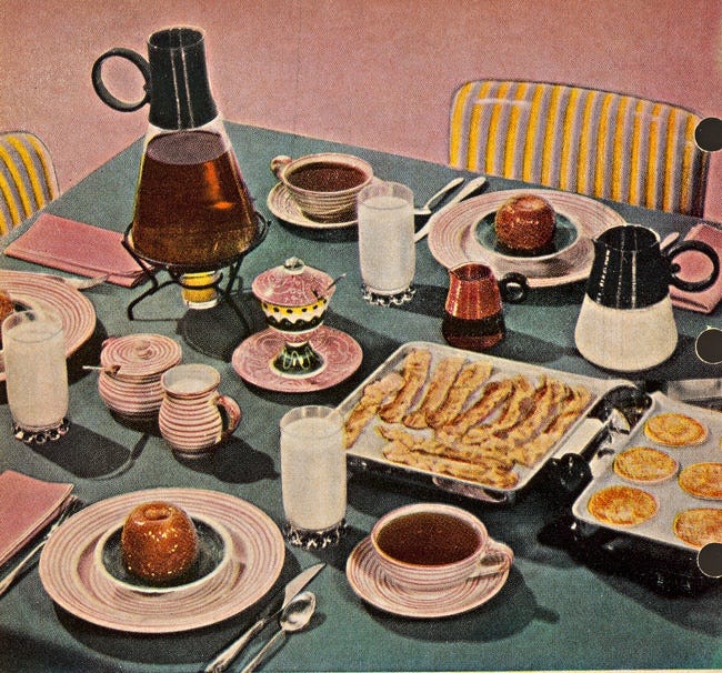 This may contain: an image of a table setting with food on it
