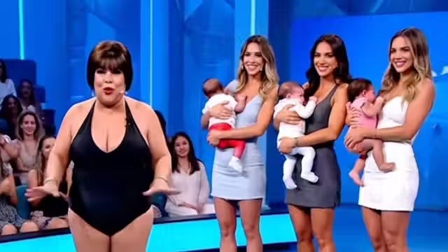 El personaje de Marisa Maiô (la mujer con el mallón negro) ha sido utilizado por una cadena minorista en una campaña publicitaria, sin remuneración alguna para su creador. Fuente: Imagen producida con Veo 3 El personaje de Marisa Maiô (la mujer con el mallón negro) ha sido utilizado por una cadena minorista en una campaña publicitaria, sin remuneración alguna para su creador. Fuente: Imagen producida con Veo 3