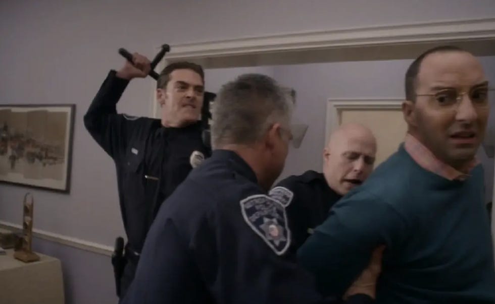 Jay Johnston is cop in Arrested Development. Also: charged with storming the capitol. 