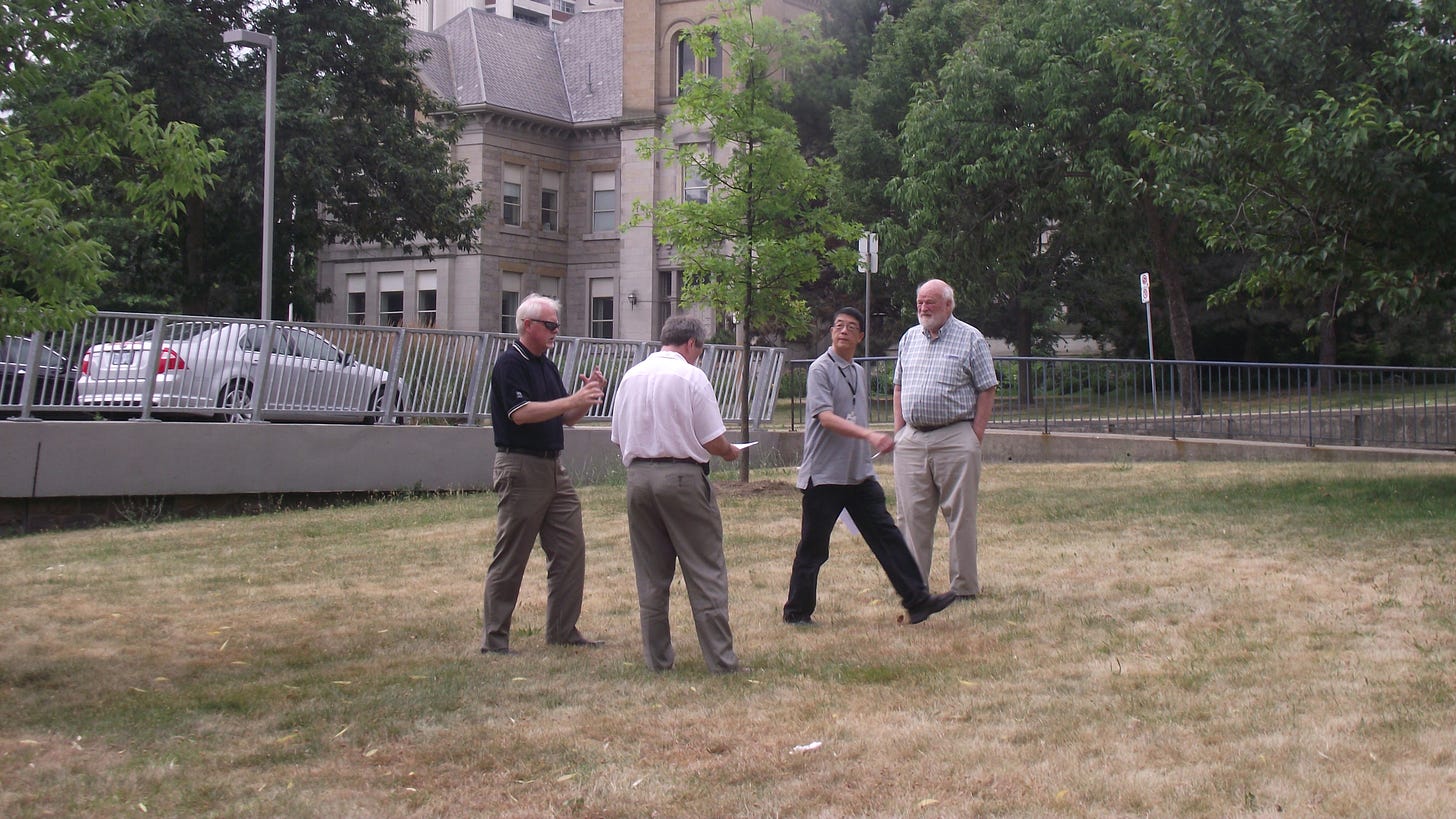 Planning for the installation of the peace pole - photo courtesy of Gail Rappolt