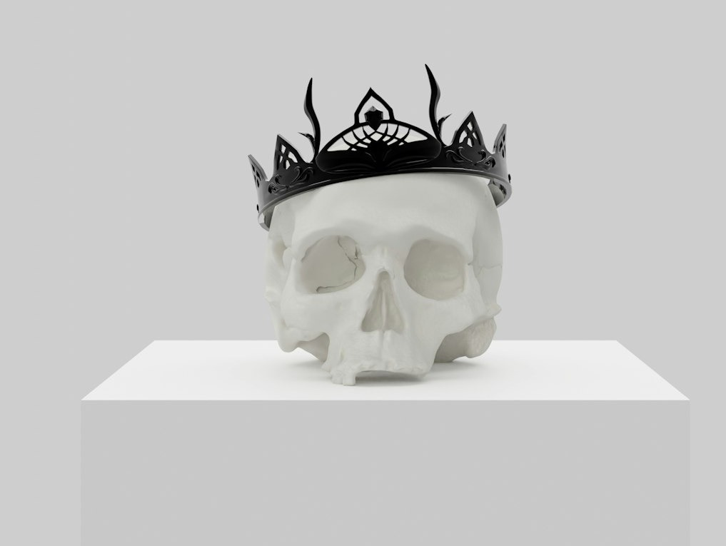 a skull with a crown on top of it a skull with a crown on top of it