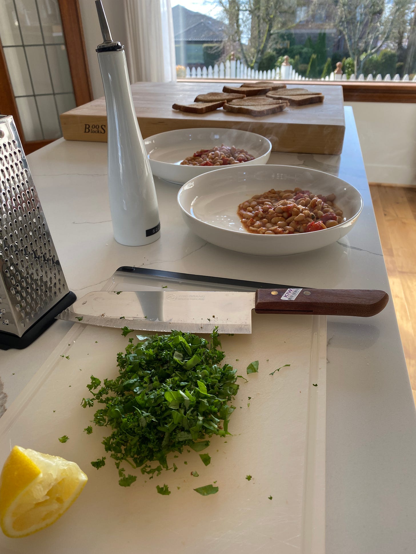 cooking brothy beans in a kitchen