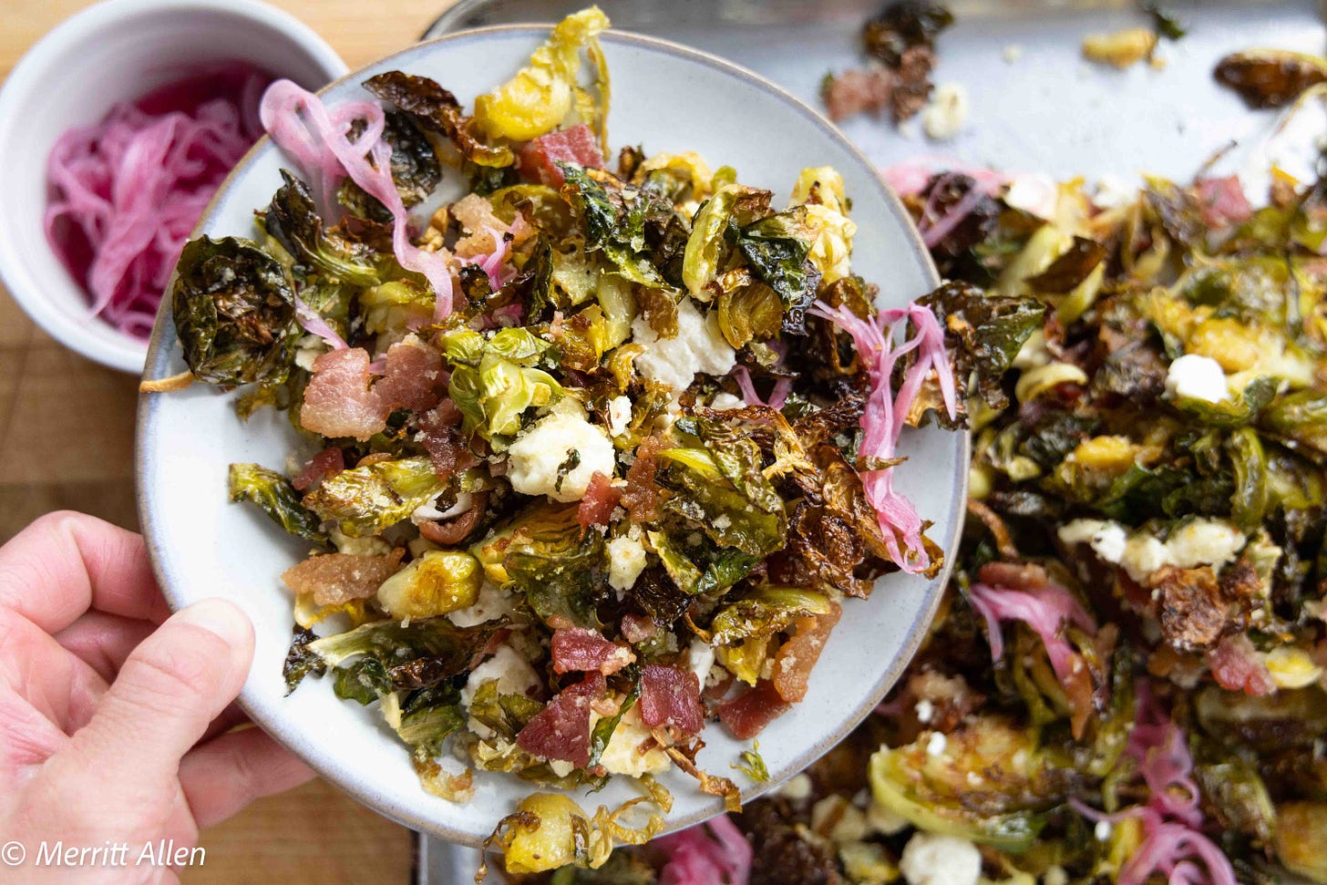 Brussels Sprouts salad with feta, bacon, and pickled onion