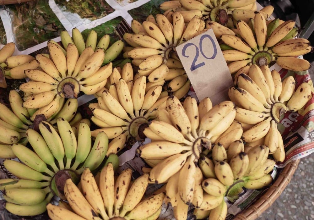 Tiny bananas at an Asian market representing high vibration food