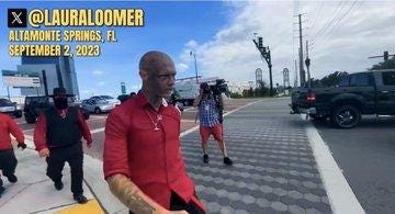 May be an image of 4 people, car, segway, road and text that says '@LAURALOOMER ALTAMONTE SPRINGS FL SEPTEMBER 2,2023'
