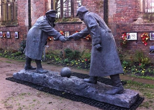 Christmas truce football statue unveiled in Liverpool - BBC News