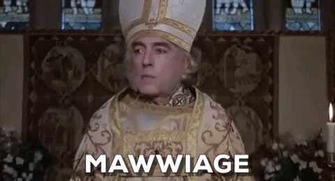 A gif from the movie "The Princess Bride." A clergyman mispronounces "marriage" as "mawwiage." (Text on gif says "Mawwiage")