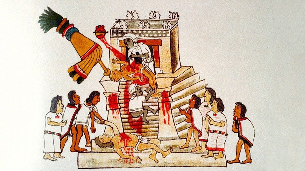 Aztec priests sacrificing prisoners of war