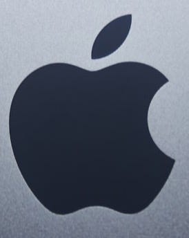 apple logo on blue surface