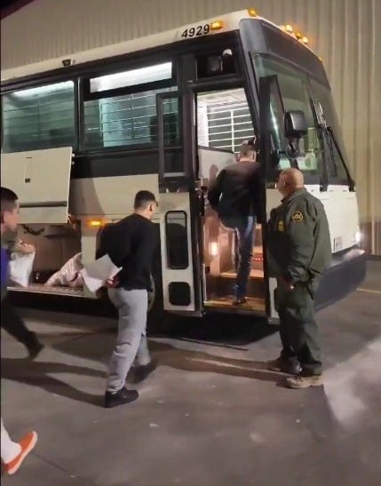 Migrants board bus in South Texas - first step in their removal from the USA