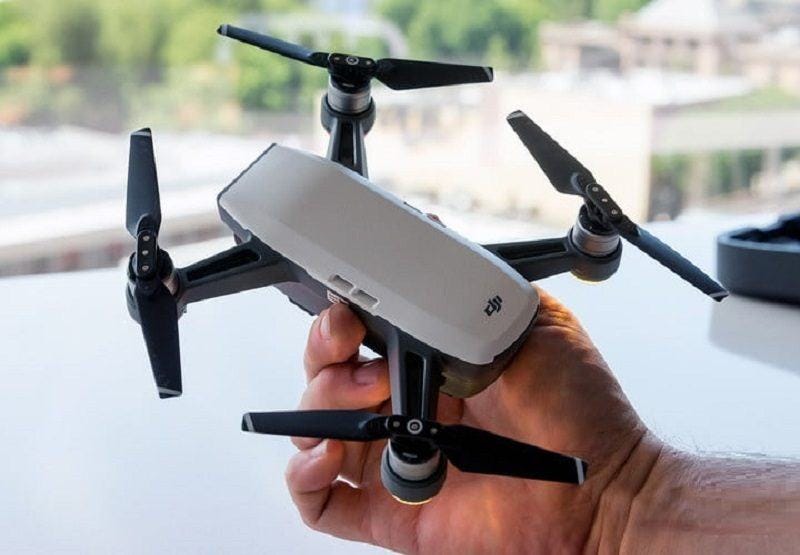 dji spark drone mini in hand