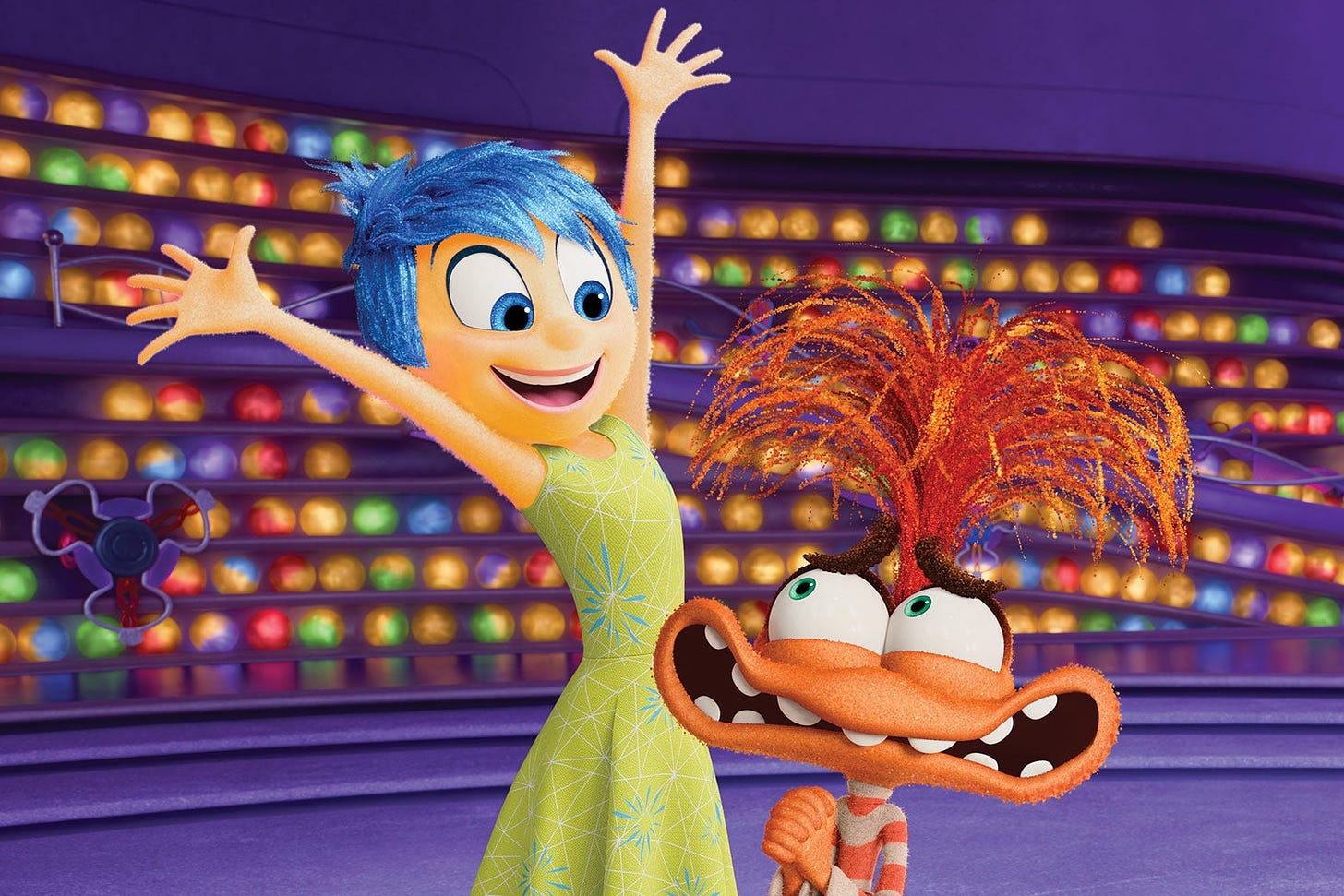 Joy reaching her arms out in excitement over Anxiety in Pixar's Inside Out 2.