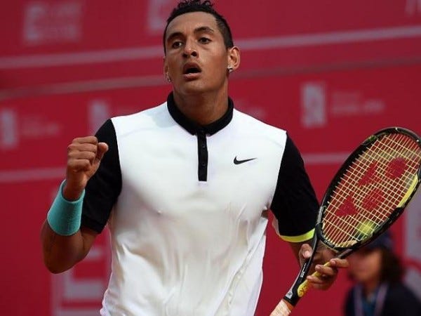 nick kyrgios beats roger federer madrid open 2015