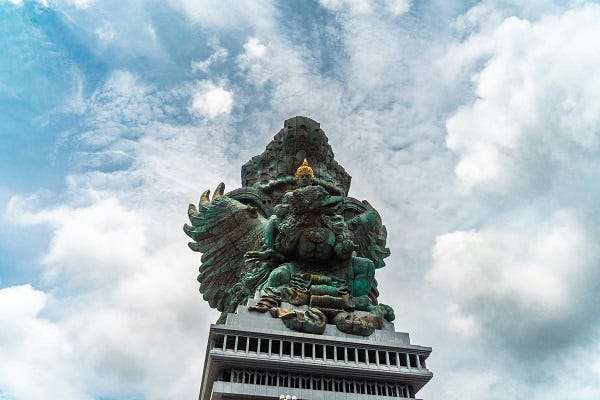 Standing under the Statue