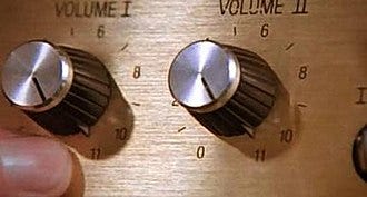 A frame from the film Spinal Tap showing volume knobs that go up to 11.