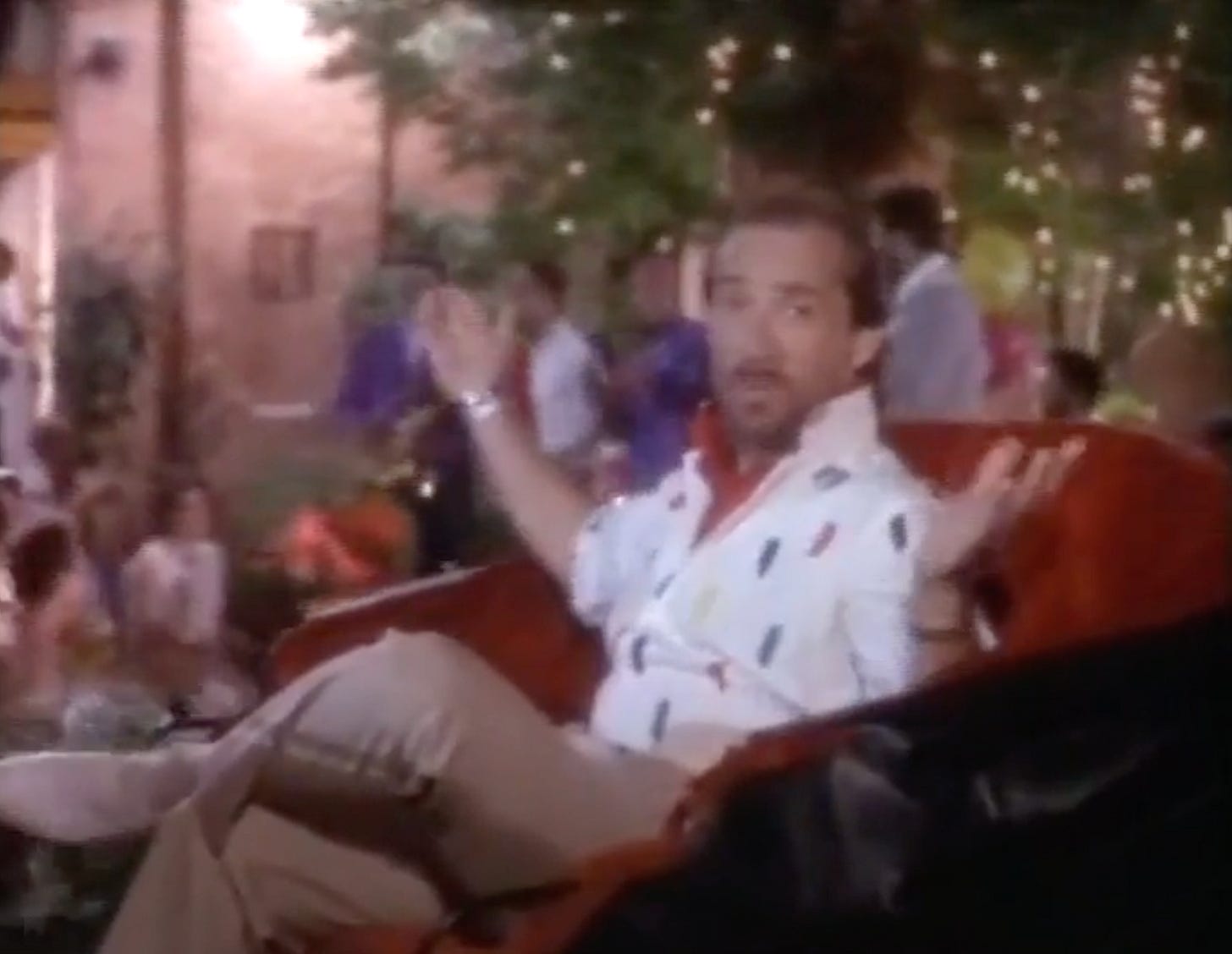 Lee Greenwood riding in a carriage