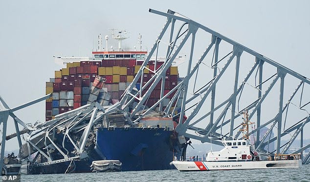 Multiple alarms sounded on board the doomed Dali cargo ship in the minutes before it collided with Baltimore's Key Bridge (pictured the morning after the impact on Tuesday)