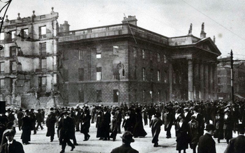This image has an empty alt attribute; its file name is mi_gpo_post_office_easter_rising_1916_people_post_destruction.jpg