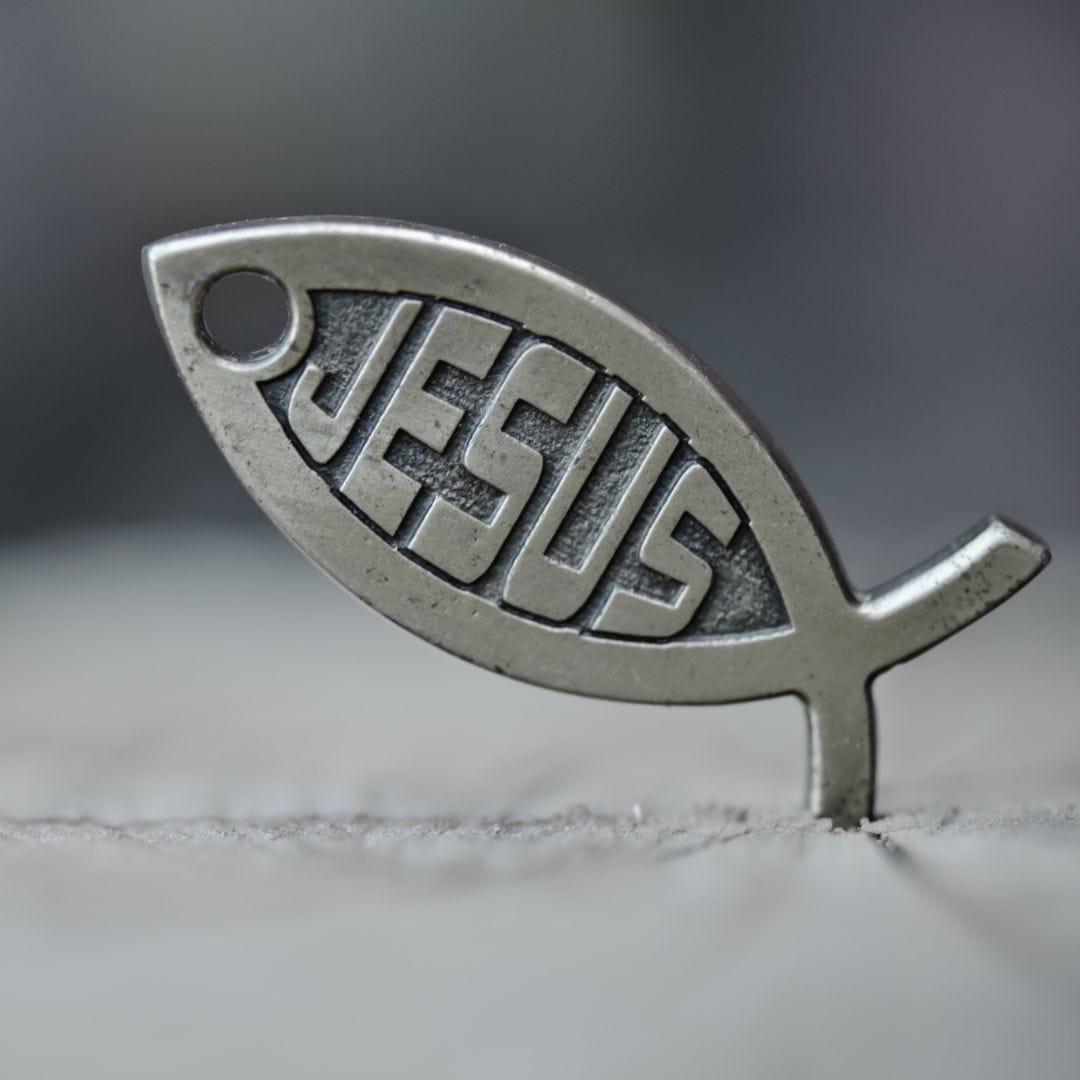 Image of metal fish symbol with the word Jesus inside.