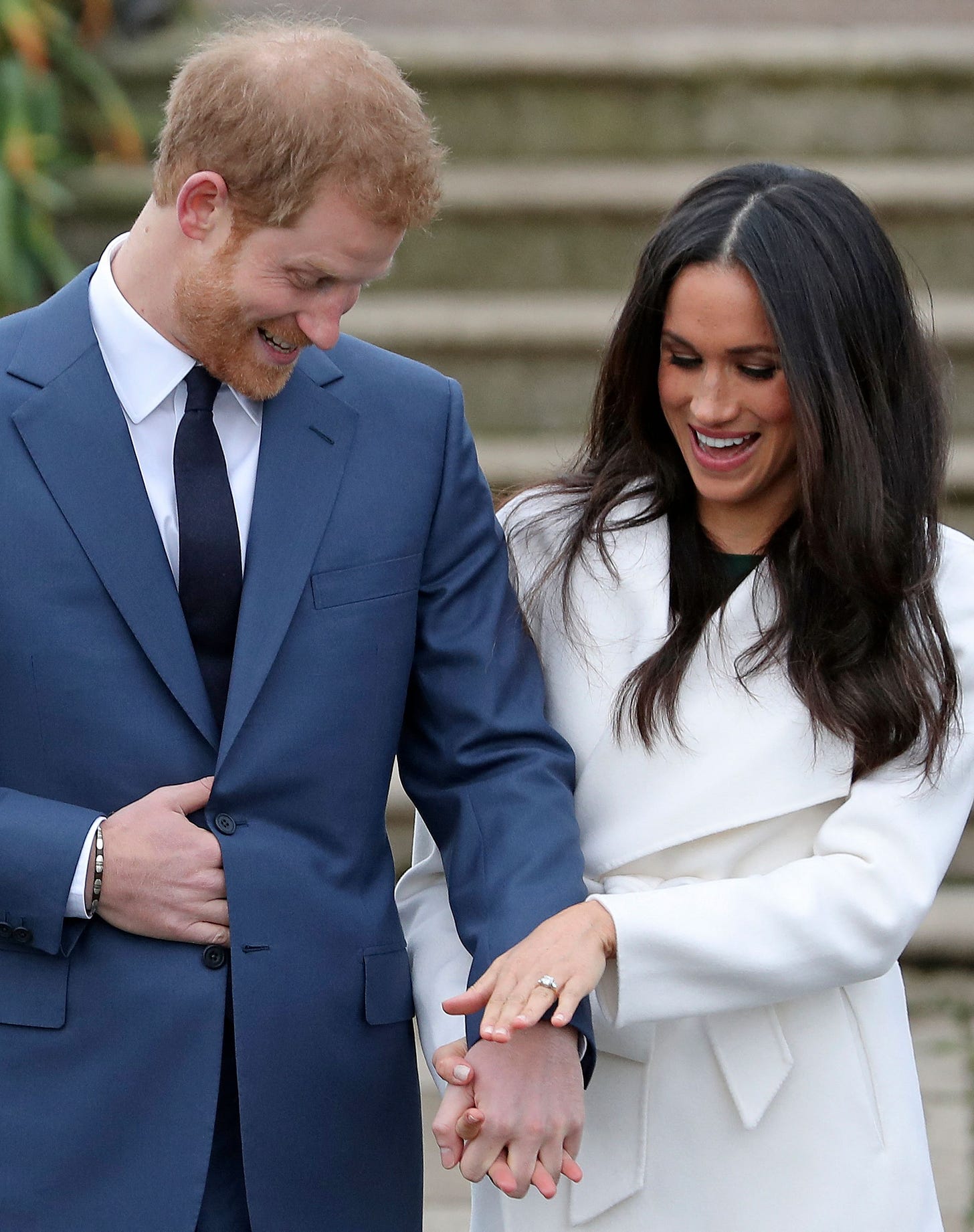 prince harry and meghan markle pose for engagement photocall