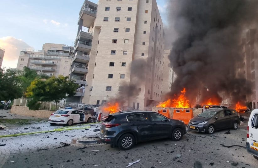 The scene where a rocket fired from Gaza into Southern Israel, hit and caused damaged in the southern Israeli city of Ashkelon. October 7, 2023. (credit: EDI ISRAEL/FLASH90) The scene where a rocket fired from Gaza into Southern Israel, hit and caused damaged in the southern Israeli city of Ashkelon. October 7, 2023. (credit: EDI ISRAEL/FLASH90)