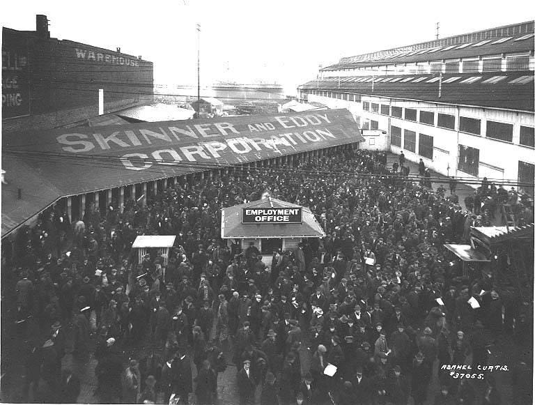 May be a black-and-white image of crowd and text that says 'W WAREMOUSE SkIpe CORPOTITION AND CRATION TION EDDY CORP EMPLOYMENT MENT EMPLO OFFICE RSAHEL ASANELCUATIS CUATIS 37065'