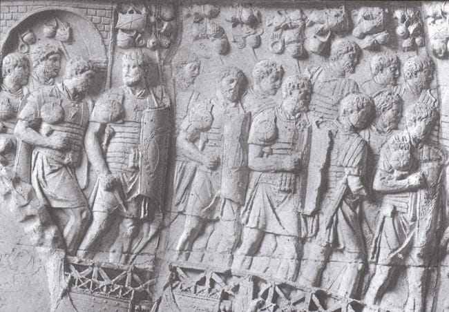 B/w photograph of legionaries marching, from Trajan's Column.