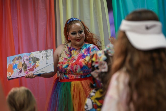 Lady Liliana V. Davenport reads a story to kids during Lubbock's Pride Fest 2024, this annual event includes a festival and drag show, Saturday, June 22, 2024, at the Louise Hopkins Underwood Center for the Arts.