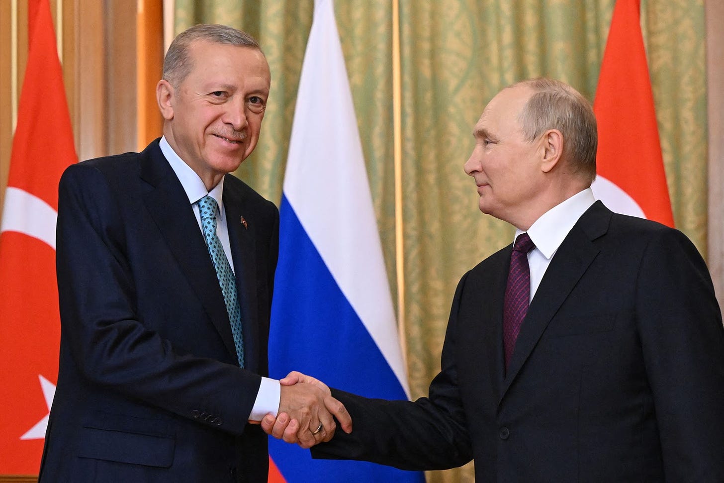 Russian President Vladimir Putin meets with Turkish President Recep Tayyip Erdogan.