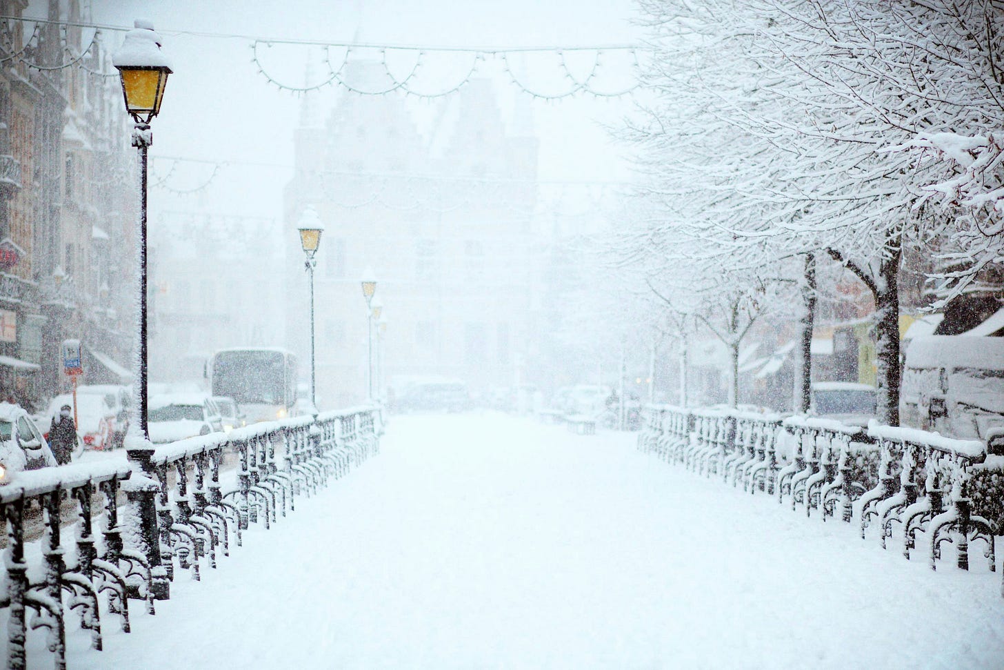 Snowfall-obscured street, courtesy of Filip Bunkens on Unsplash