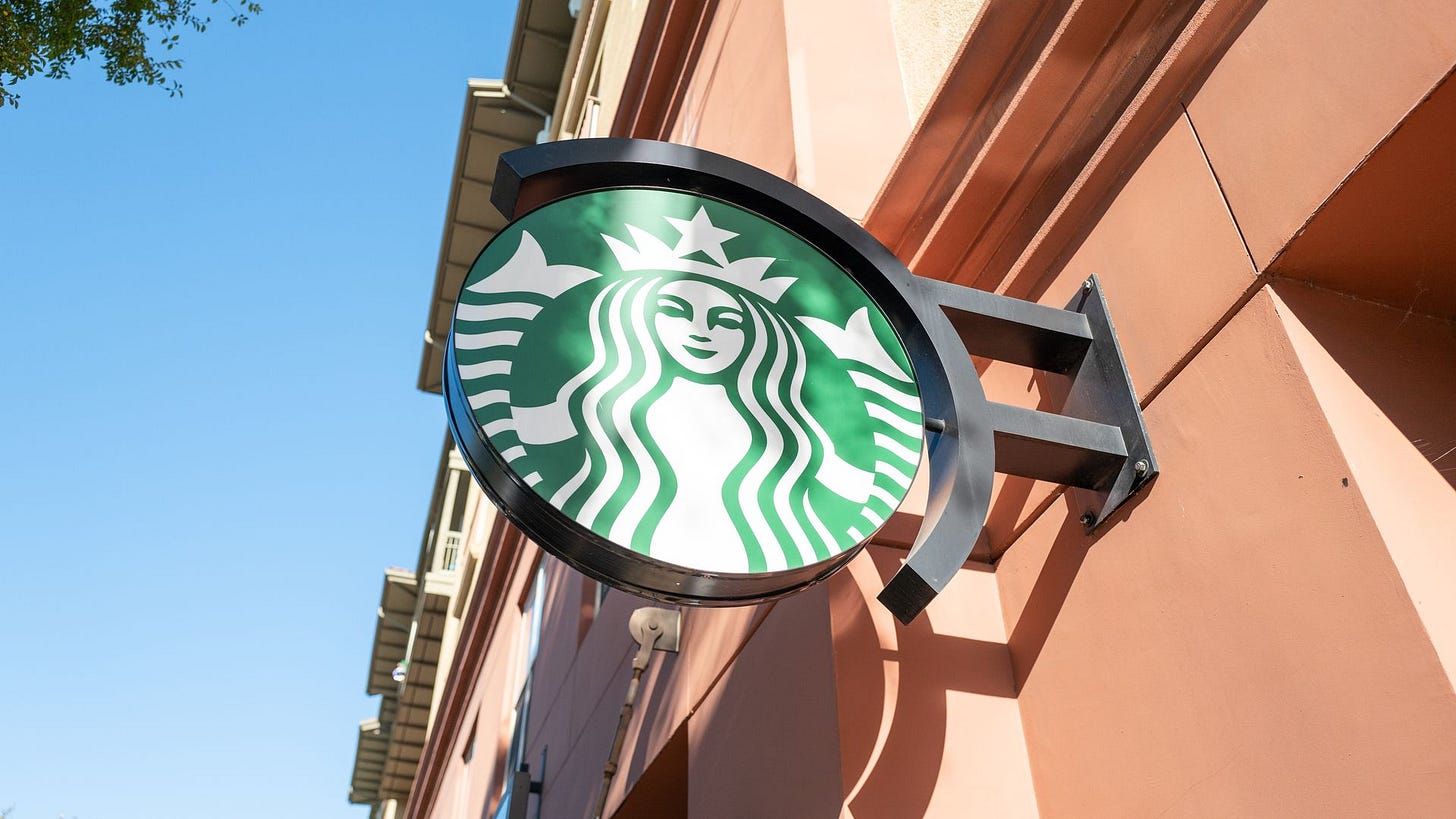 The green Starbucks logo attached to a building