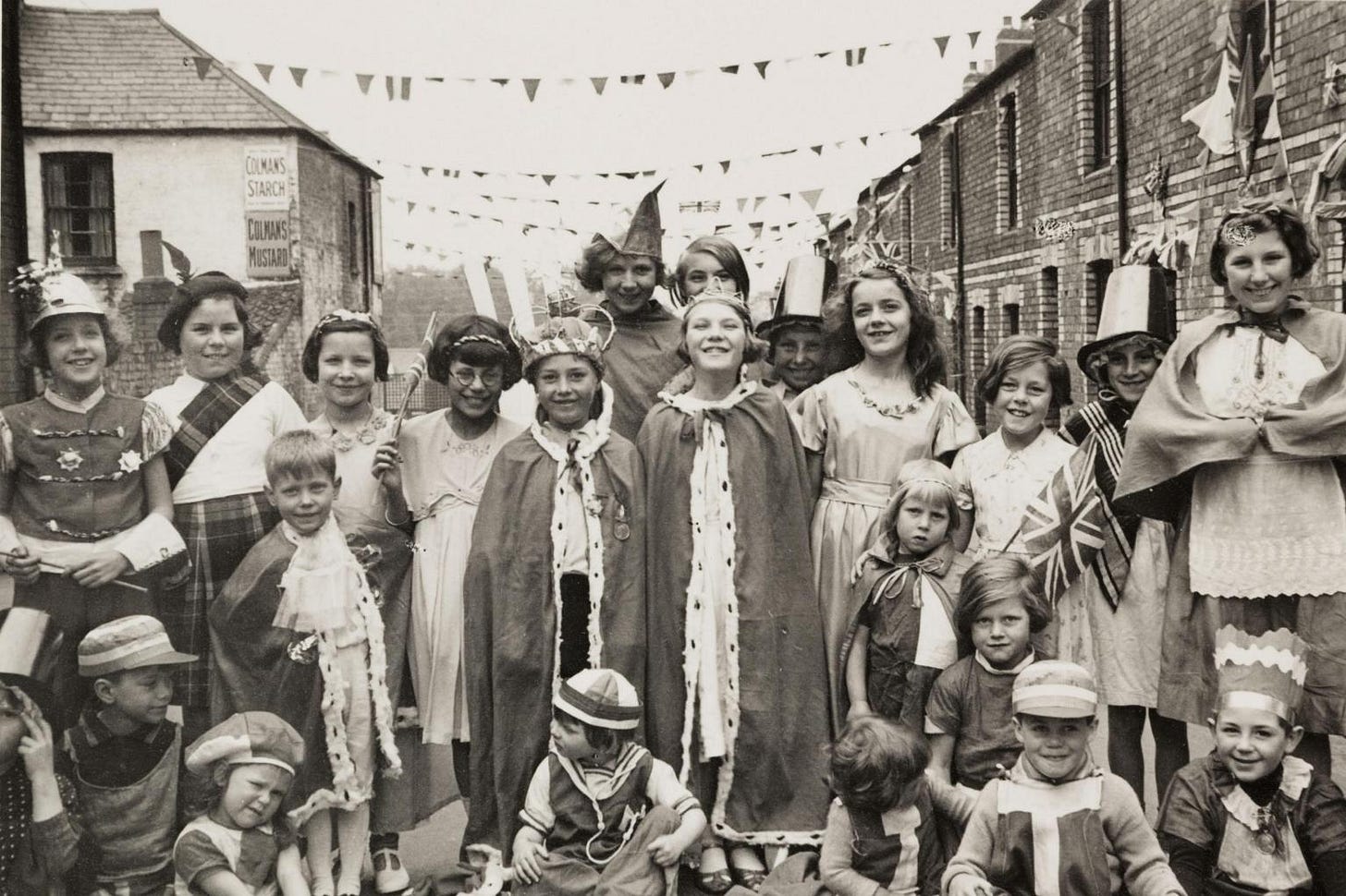Children in Cardiff wear fancy dress to mark George VI’s coronation