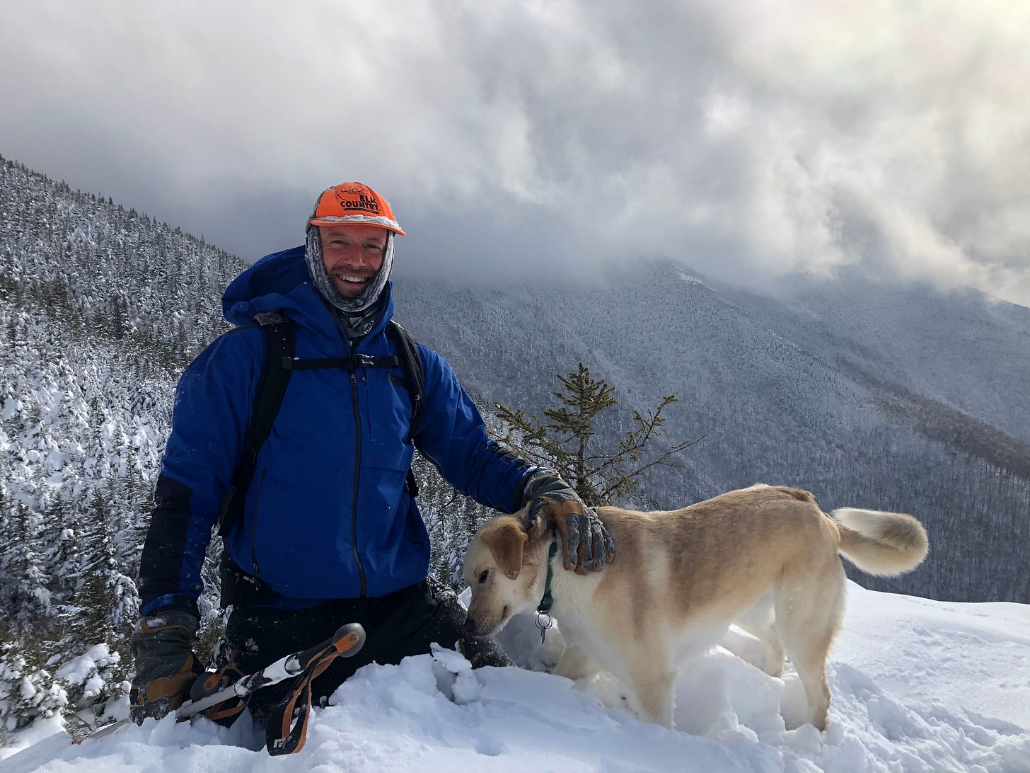 Jesse McEntee and his dog, Maya, enjoying the snow on a ridge of the Green Mountains of Vermont.