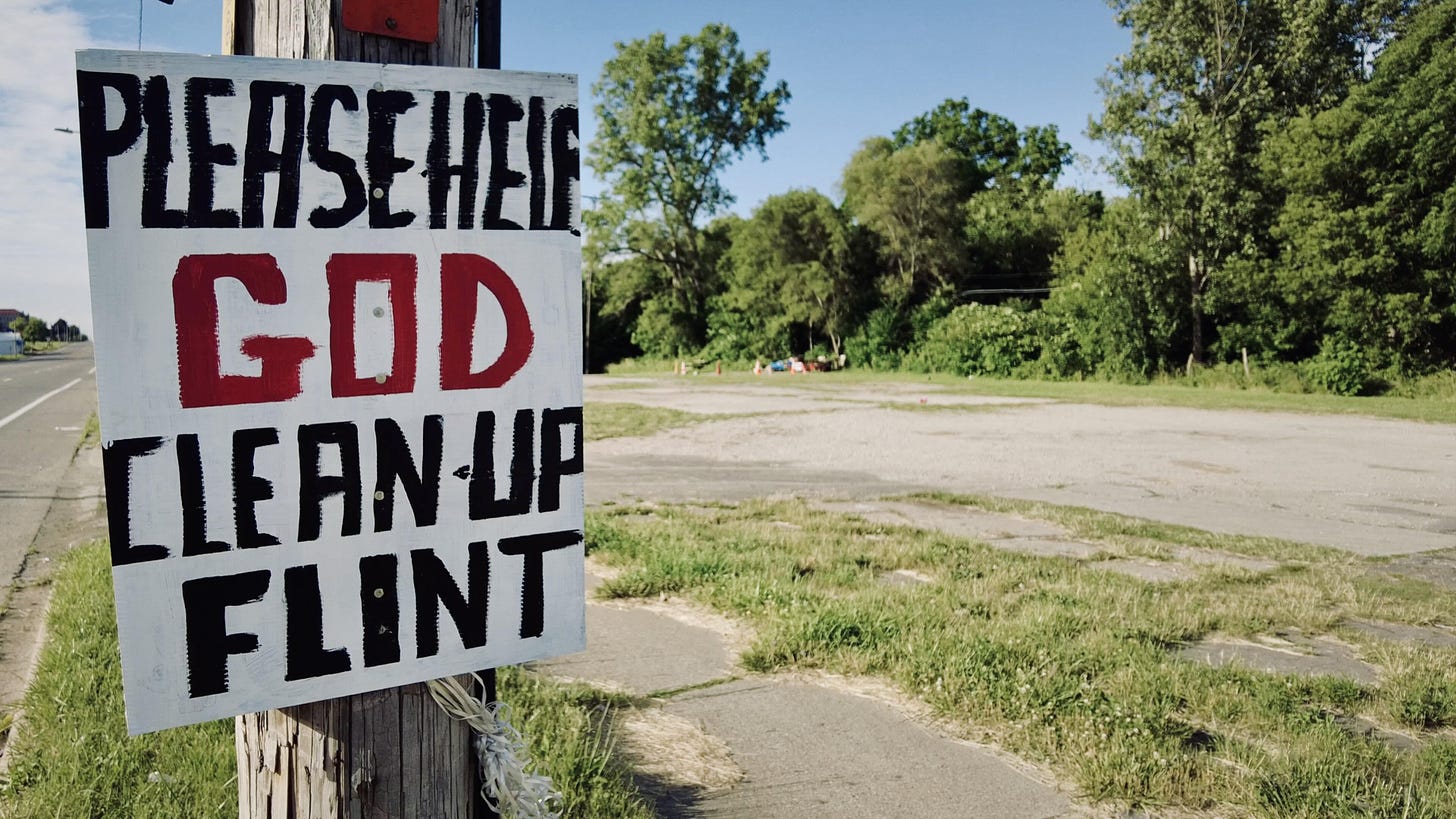 Somebody goes around Flint, Michigan posting signs like these at abandoned  buildings and lots [OC] : r/AbandonedPorn