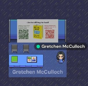 Image of virtual Lingcomm booth for Gretchen McCulloch. Blue background that mimics carpet and a blue square with pixel chairs and table. Displays QR codes and Because Internet and an avatar of Gretchen. 
