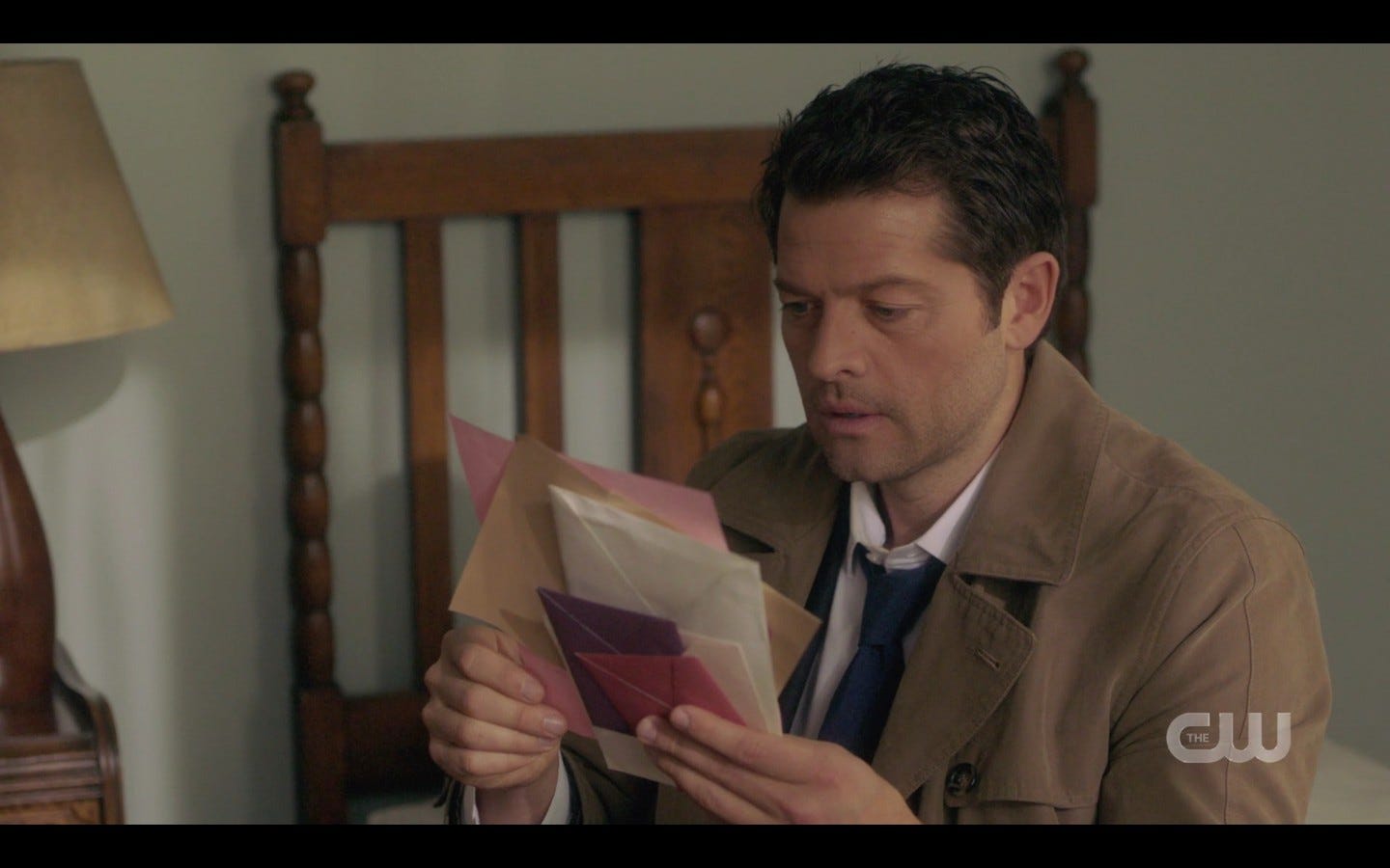 Castiel looking under Justins mattress with Sam Winchester SPN 14.15