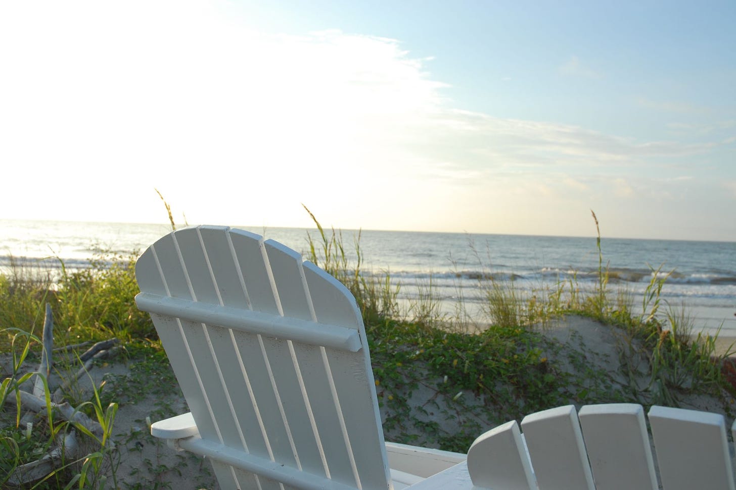 Adirondack chair overlooking beach
