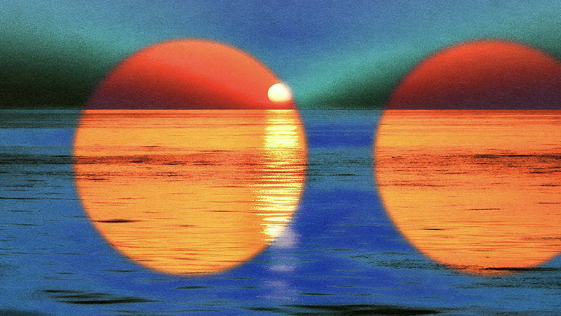 Setting sun over a lake or ocean