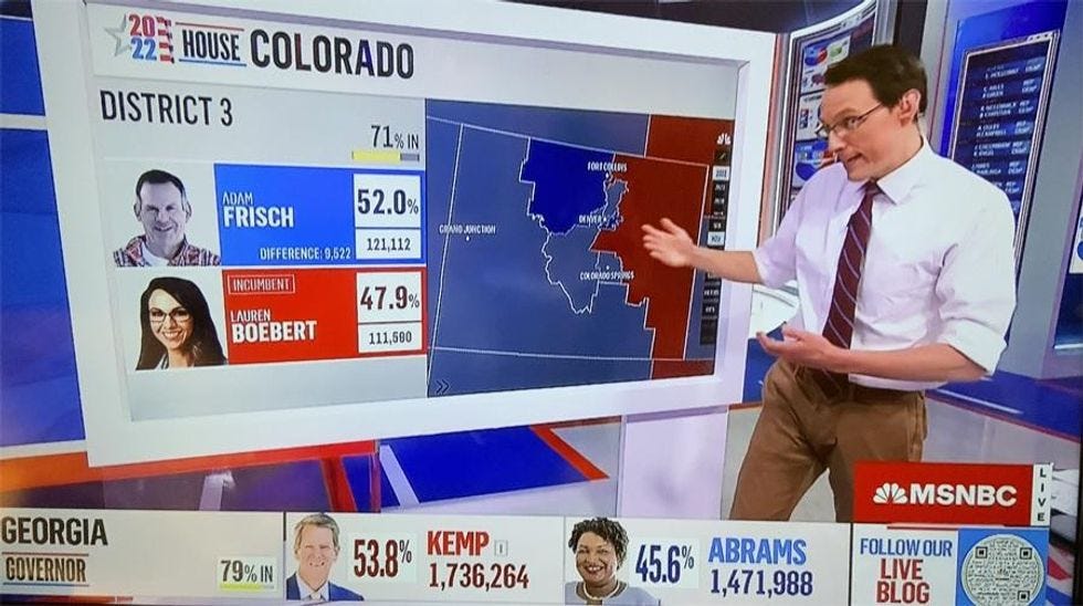 screenshot of Steve Kornacki on MSNBC, his "big board" showing Adam Frisch ahead of Lauren Boebert by a 52 percent to 47.9 percent margin on Election Night, with 71 percent of the votes counted.