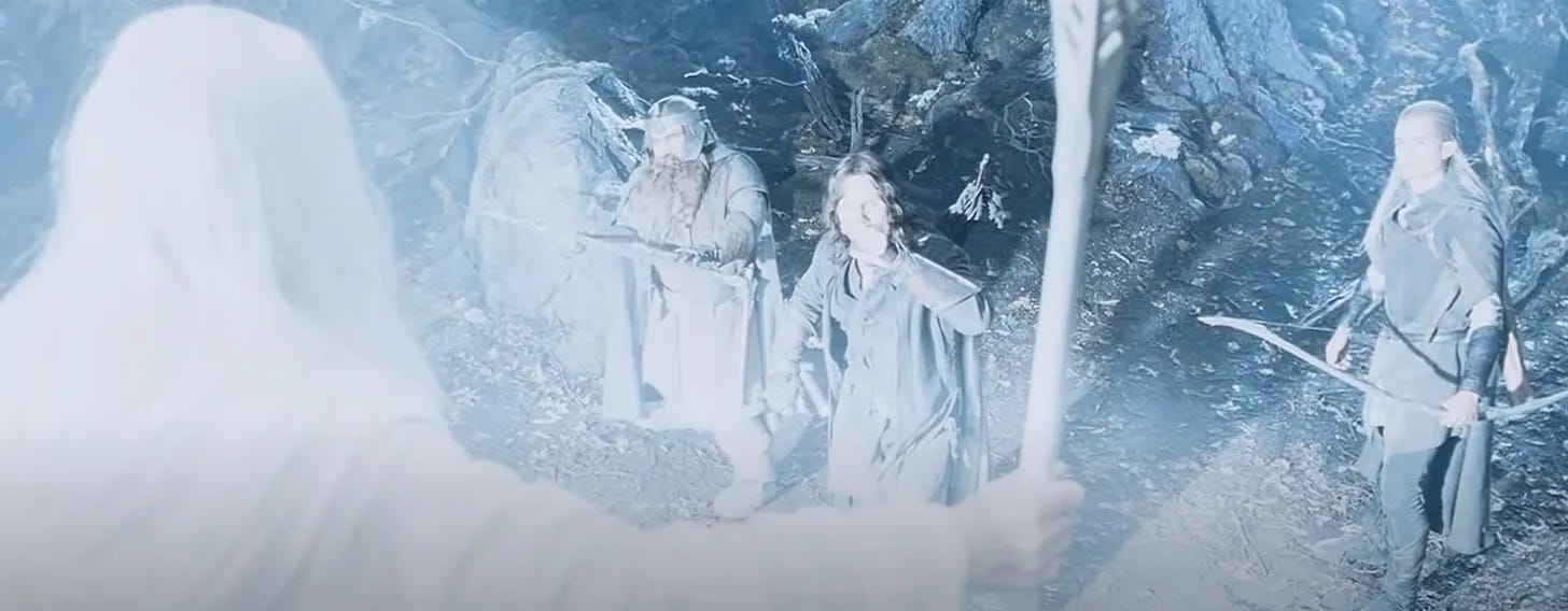 A white figure shines and Aragorn, Gimli, and Legolas are trying to see who it might be through the glare