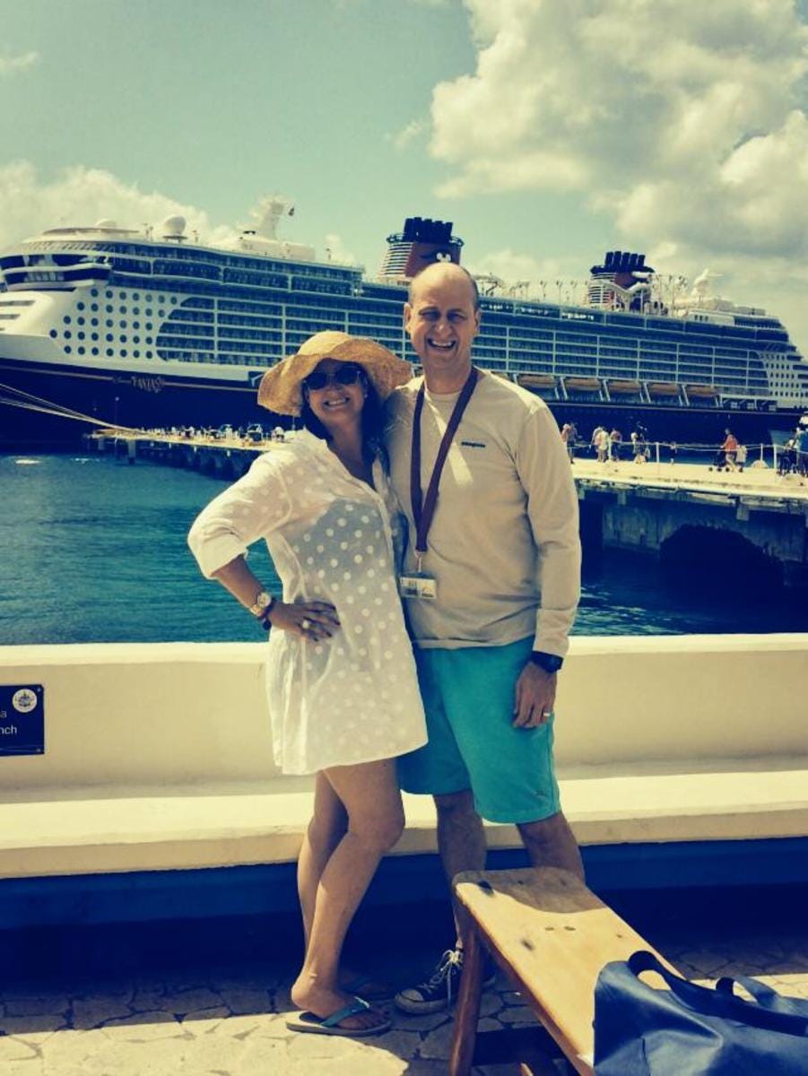 O'Rourke standing in front of a cruise ship