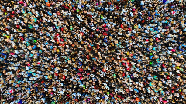 Big crowd of people. People gathered together in one place. Top view from drone. Big crowd of people. People gathered together in one place. Top view from drone. crowd of people stock pictures, royalty-free photos & images