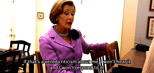 Lucille Bluth from Arrested Development sitting in a chair in a purple suit and saying "If that's a veiled criticism about me, I won't hear it and I won't respond to it."