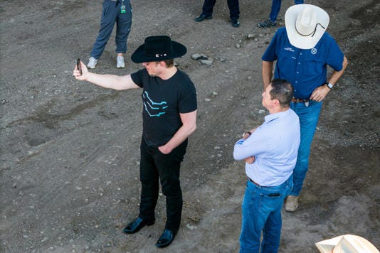 Elon Musk is seen wearing a cowboy hat at the US-Mexico border on Thursday. John Moore/Getty Images