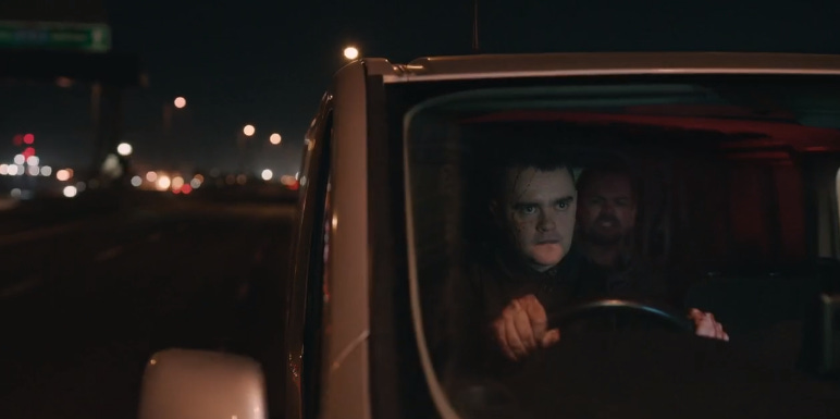 A tense scene between three men over a hostage, in a van, in the TV series Slow Horses