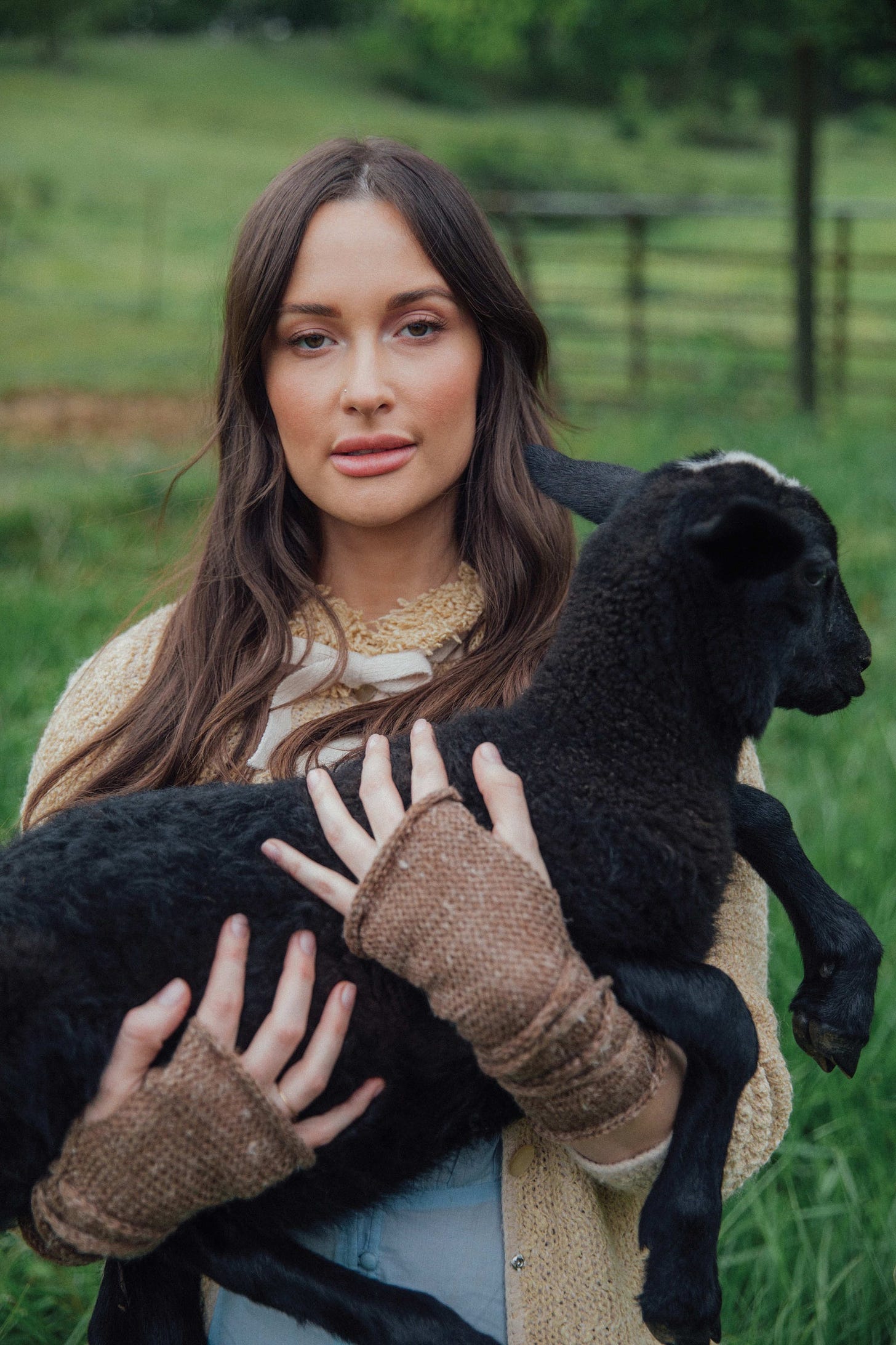 Image may contain Kacey Musgraves Face Head Person Photography Portrait Clothing Glove Adult and Accessories