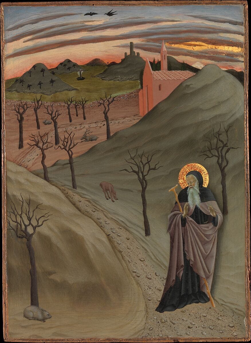 15th century painting of St. Anthony in the desert with a red sunrise in the background